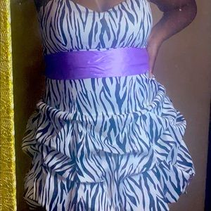 A Ruby Rox Zebra Print Lavender Wrap Mini Dress